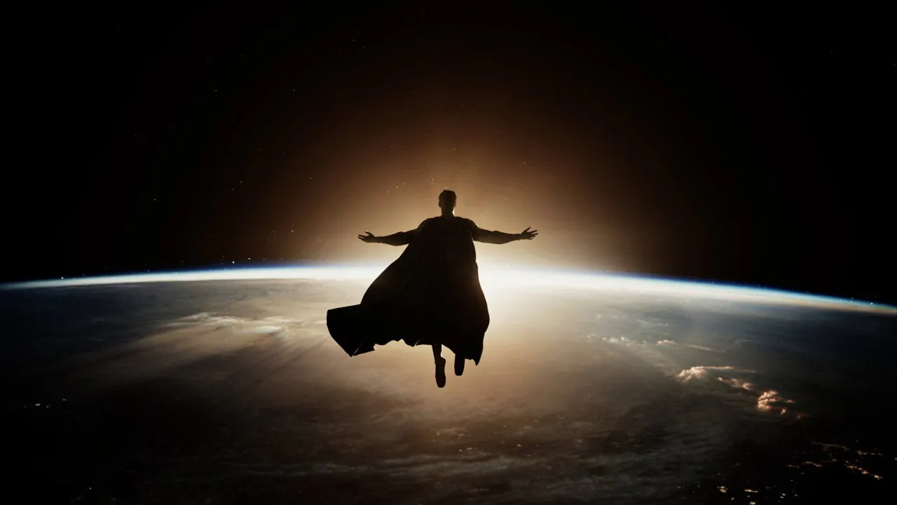 Superman in silhouette over Earth, in official still from Zack Snyder's cut of Justice League